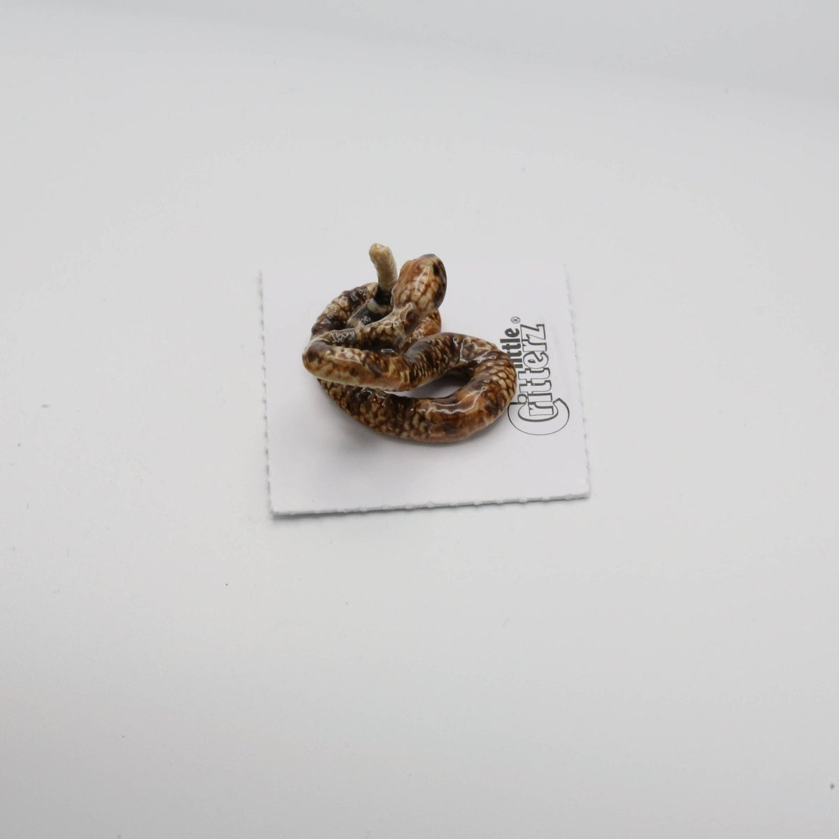 Shakes Rattlesnake Porcelain Miniature - vibeboxshop