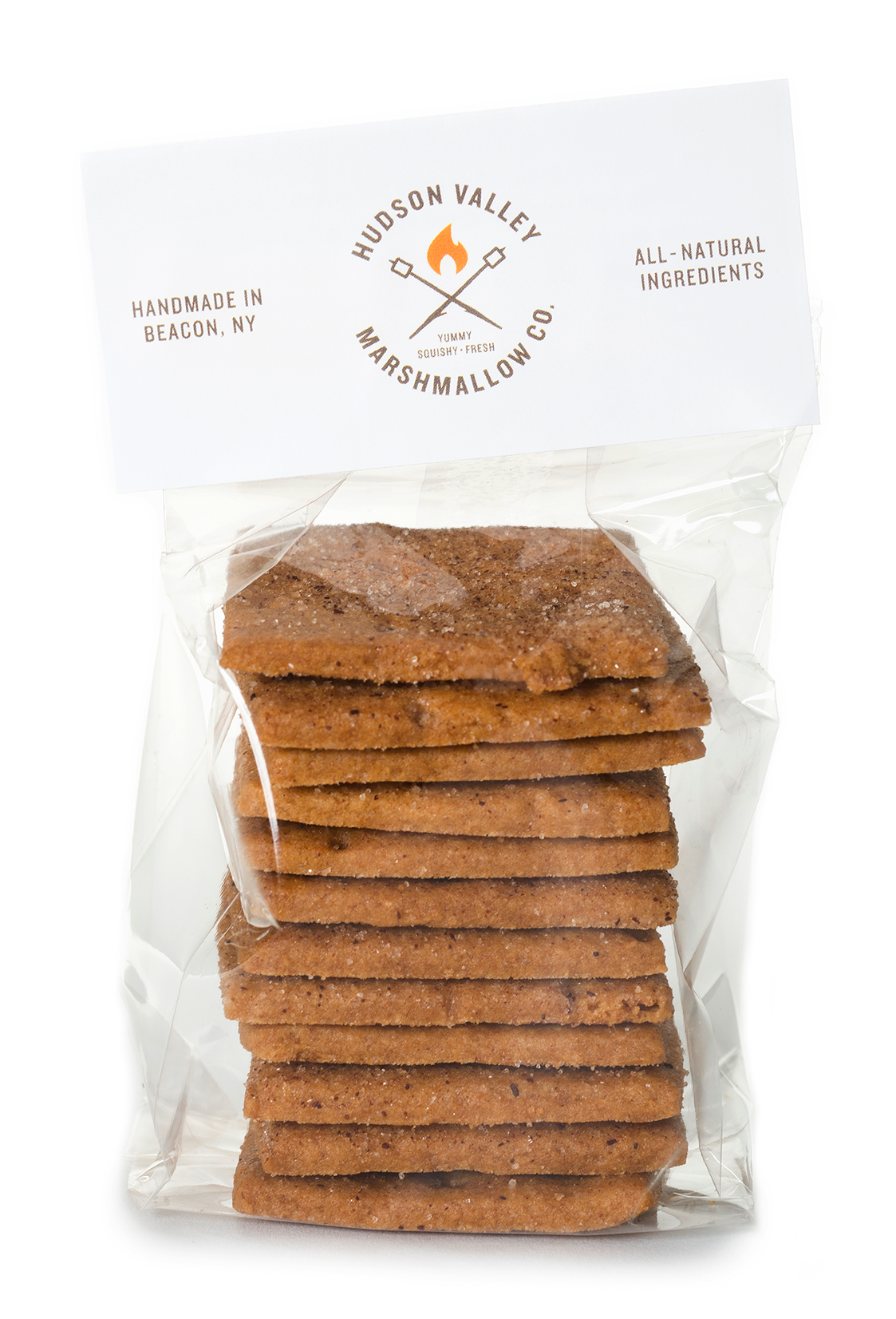 A clear plastic bag of Hudson Valley Marshmallow Co. square graham crackers with a white paper header card.