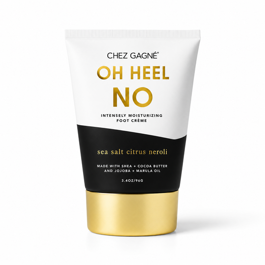 White and black bottle of Foot Cream labeled "Oh Heel No"